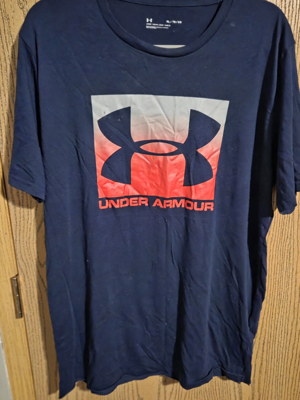 Under Armour Navy Short Sleeve Tee with Red Logo Graphic